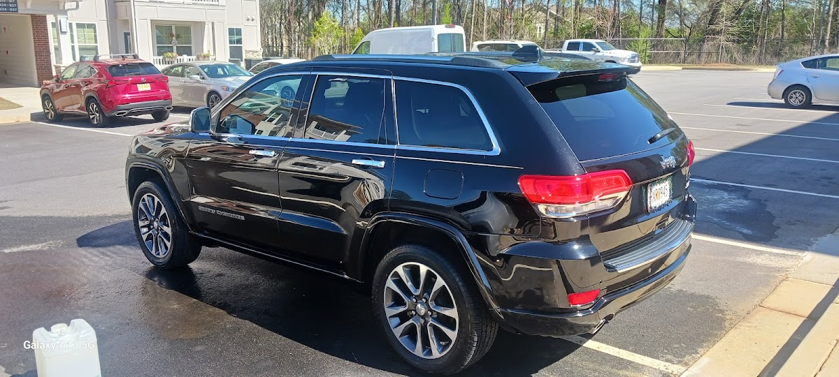 Black Jeep Grand Cherokee cleaned and gleaming after an exterior detail