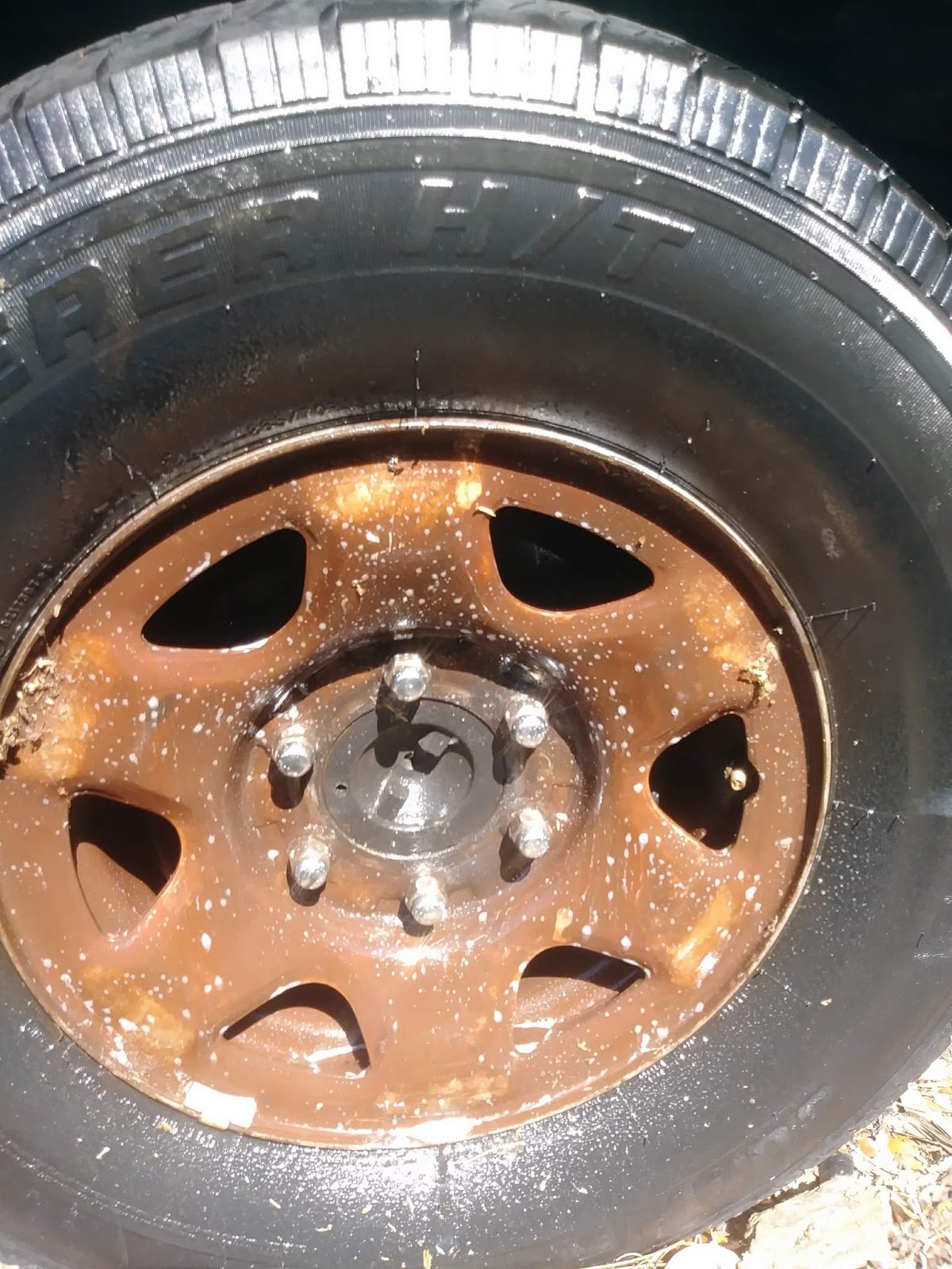 Heavily rusted wheel before restoration — the kind of neglected vehicle We Do It All Detail brings back